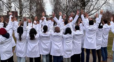 student in labcoats for Nouryon